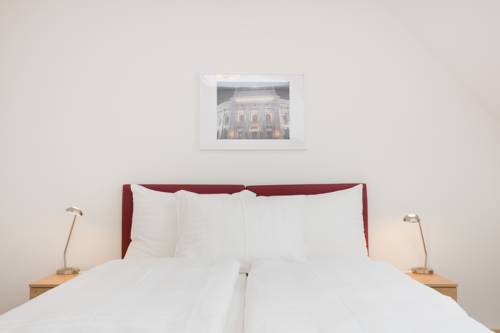 Imagen de la habitación del Dmg Apartments Hotel. Foto 10