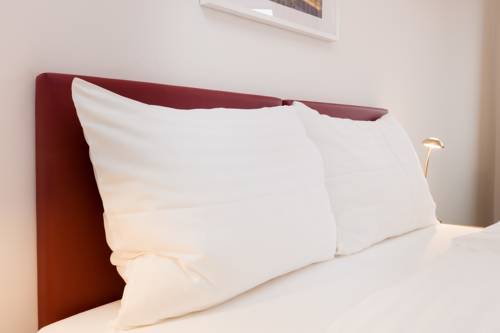 Imagen de la habitación del Dmg Apartments Hotel. Foto 11