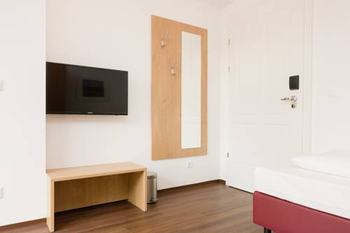 Imagen de la habitación del Dmg Apartments Hotel. Foto 13