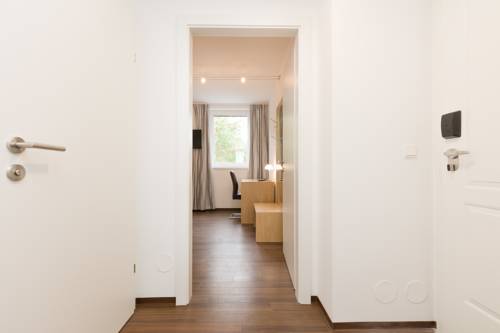 Imagen de la habitación del Dmg Apartments Hotel. Foto 15