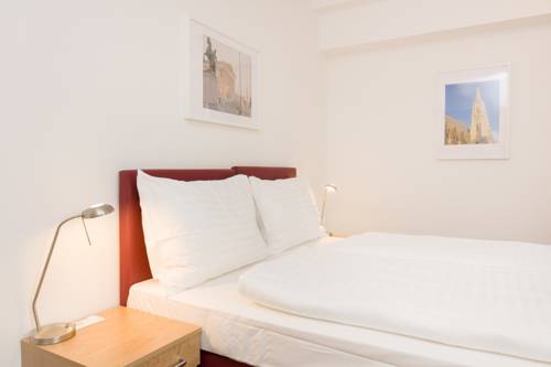 Imagen de la habitación del Dmg Apartments Hotel. Foto 16