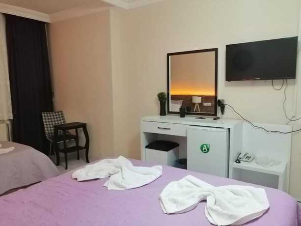 Imagen de la habitación del Doğa Otel. Foto 6