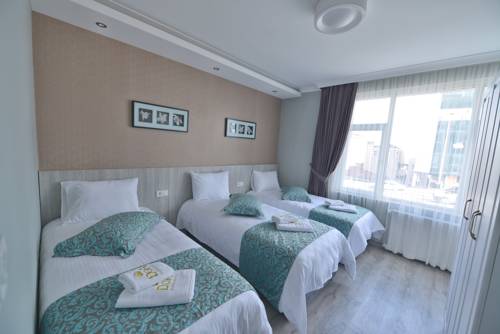 Imagen de la habitación del Doa Suite Hotel, Ortahisar. Foto 4
