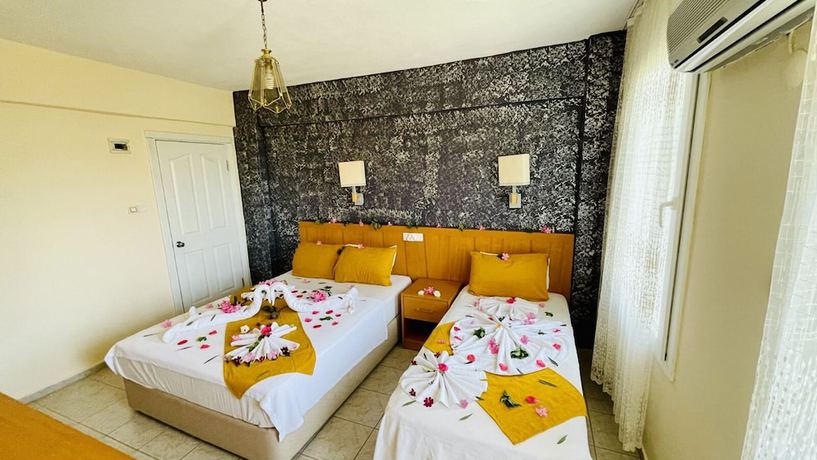 Imagen de la habitación del Doga Hotel, &Ouml;l&uuml;deniz. Foto 16