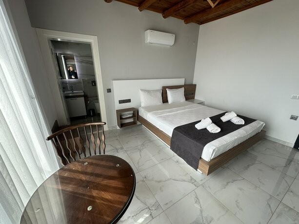 Imagen de la habitación del Doganin Ruhu Hotel and Bungalow. Foto 16