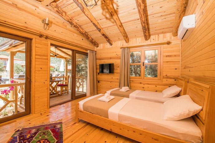 Imagen de la habitación del Doganin Ruhu Hotel and Bungalow. Foto 18