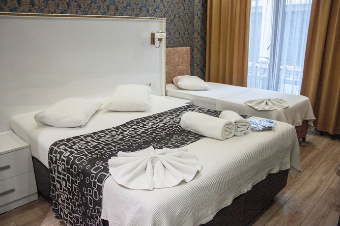 Imagen de la habitación del Dolce Vita Suite Hotel. Foto 3