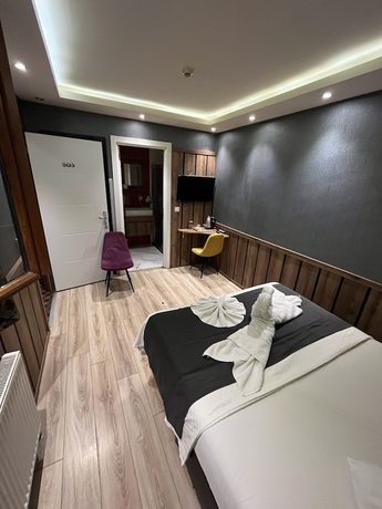 Imagen de la habitación del Dolce Vita Suite Hotel. Foto 12