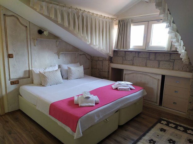 Imagen de la habitación del Dolina Boutique Hotel. Foto 13