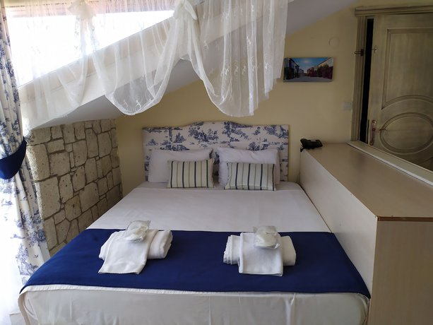 Imagen de la habitación del Dolina Boutique Hotel. Foto 15