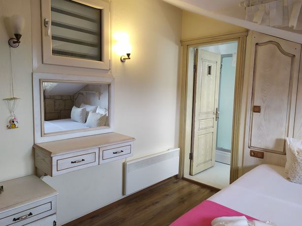 Imagen de la habitación del Dolina Boutique Hotel. Foto 18
