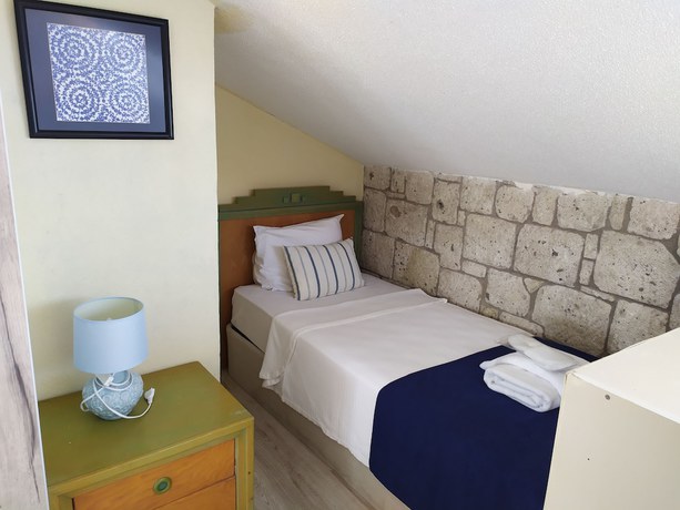 Imagen de la habitación del Dolina Boutique Hotel. Foto 19