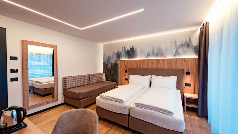 Imagen de la habitación del Dolomites Resort Formi&egrave;. Foto 7