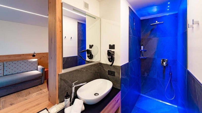 Imagen de la habitación del Dolomites Resort Formi&egrave;. Foto 9