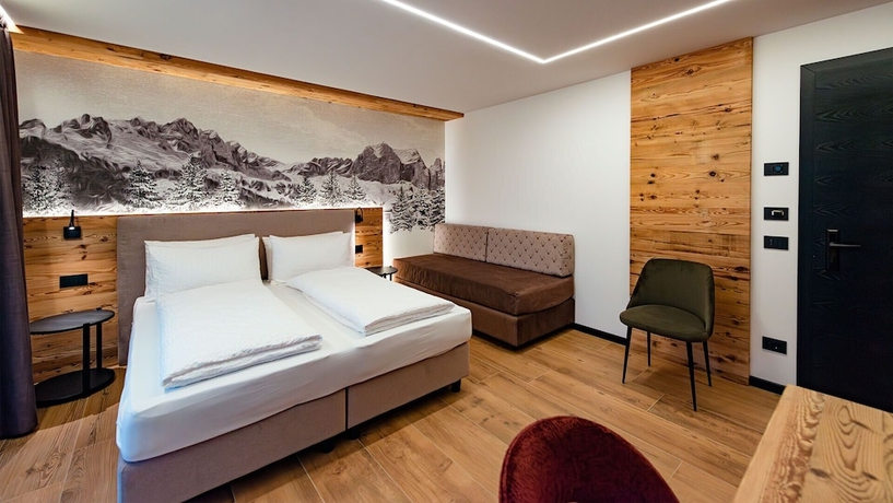 Imagen de la habitación del Dolomites Resort Formi&egrave;. Foto 12