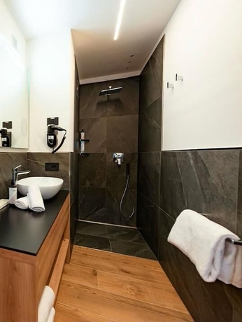Imagen de la habitación del Dolomites Resort Formi&egrave;. Foto 14