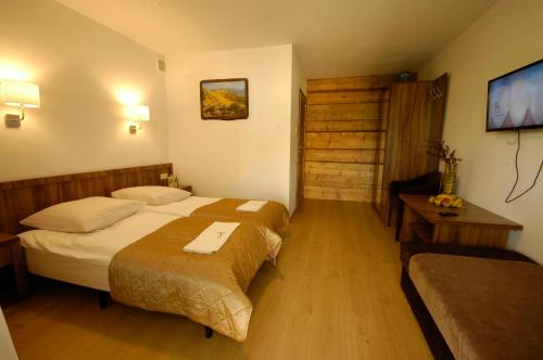 Imagen de la habitación del Dom na Skale - Apartamenty w Bieszczadach nad Soliną. Foto 5
