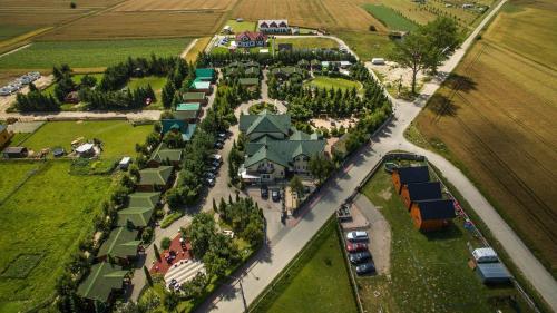 Imagen de la habitación del Domki i Pokoje Zielony Zakątek - Mini Zoo - Duży Plac Zabaw - Komfort i Cisza. Foto 16