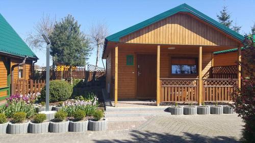 Imagen de la habitación del Domki i Pokoje Zielony Zakątek - Mini Zoo - Duży Plac Zabaw - Komfort i Cisza. Foto 19