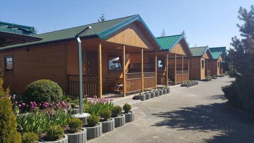 Imagen general del Domki i Pokoje Zielony Zakątek - Mini Zoo - Duży Plac Zabaw - Komfort i Cisza. Foto 8