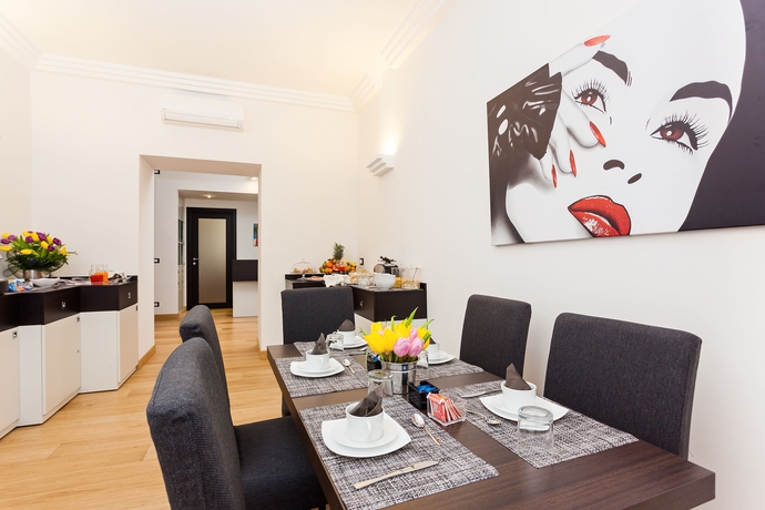 Imagen del bar/restaurante del Domus Best - Guest House. Foto 3