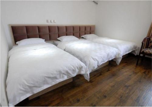 Imagen de la habitación del Dongbei Hotel. Foto 8