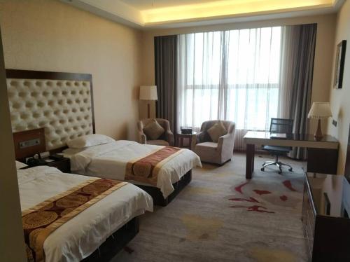 Imagen de la habitación del Donghu Mingzhu Hotel. Foto 8