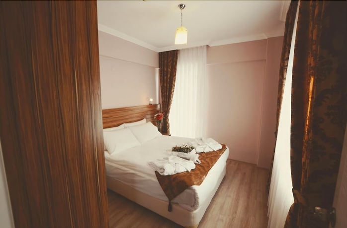 Imagen de la habitación del Dort Mevsim Suit Otel. Foto 3