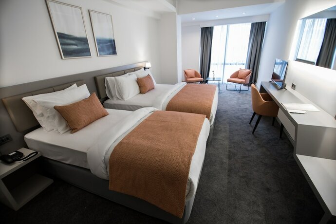 Imagen de la habitación del Dovv Hotel. Foto 15