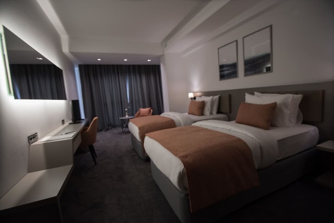 Imagen de la habitación del Dovv Hotel. Foto 16