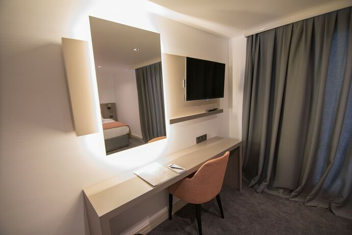 Imagen de la habitación del Dovv Hotel. Foto 18