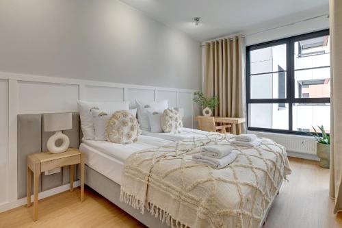 Imagen de la habitación del Downtown Apartments DOKI Living - Foodhall & Parking. Foto 16