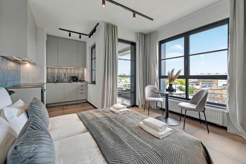 Imagen de la habitación del Downtown Apartments DOKI Living - Foodhall & Parking. Foto 17