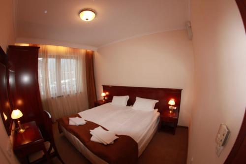 Imagen de la habitación del Downtown Bansko Resort. Foto 11