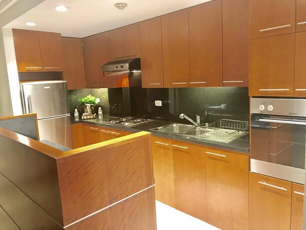 Imagen de la habitación del Downtown Retro Serviced Apartment. Foto 18