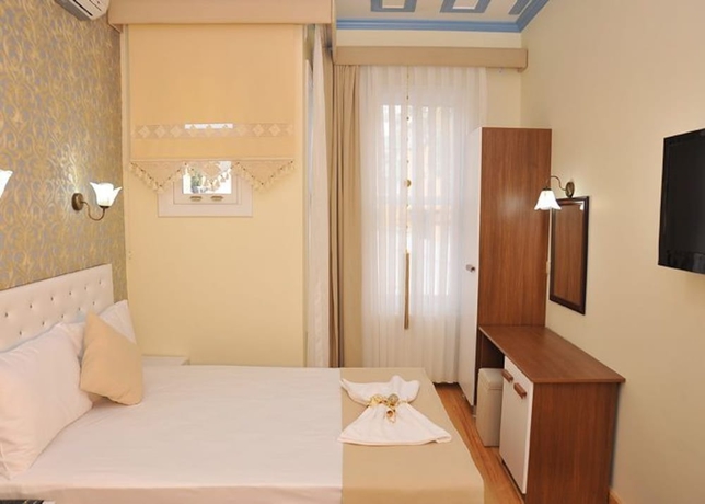 Imagen de la habitación del Dualis Hotel. Foto 11