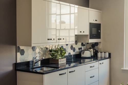 Imagen de la habitación del Dublin Central Suites. Foto 3