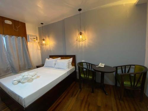 Imagen de la habitación del Dumaguete Seafront Hotel. Foto 16