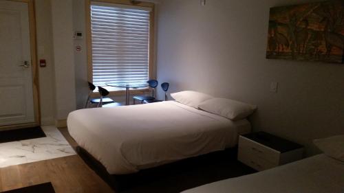 Imagen de la habitación del Dundas Apartments & Suites. Foto 7