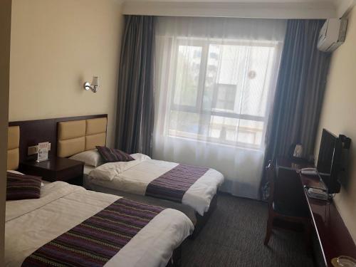 Imagen general del Dunhuang Come Back Again Inn. Foto 7