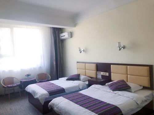 Imagen general del Dunhuang Come Back Again Inn. Foto 8