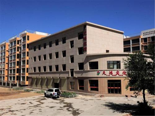 Imagen de la habitación del Dunhuang Tianhong Inn. Foto 10