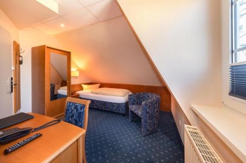 Imagen de la habitación del D&uuml;nenhotel Am Meer. Foto 6