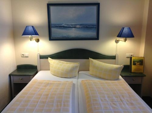 Imagen de la habitación del D&uuml;nenhotel Am Meer. Foto 7