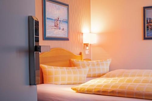 Imagen de la habitación del D&uuml;nenhotel Am Meer. Foto 8