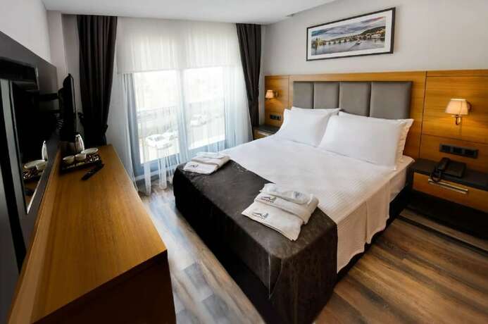 Imagen de la habitación del EMAY OTEL. Foto 11