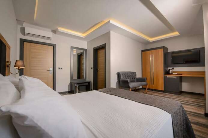 Imagen de la habitación del EMAY OTEL. Foto 12