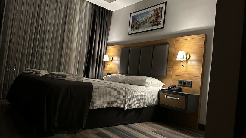 Imagen de la habitación del EMAY OTEL. Foto 13