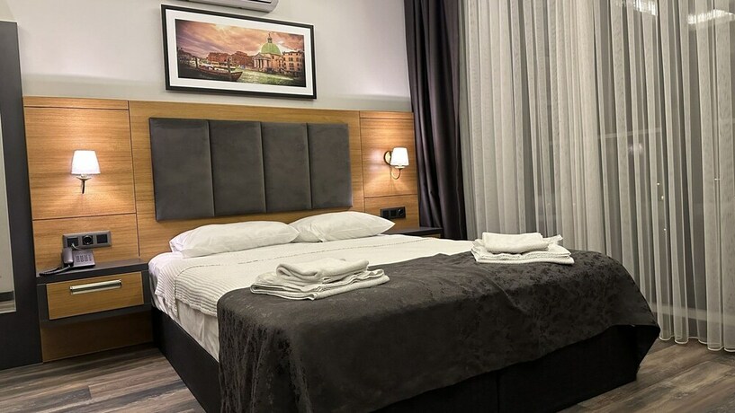 Imagen de la habitación del EMAY OTEL. Foto 18