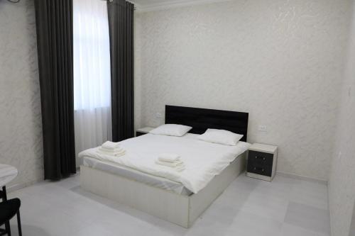 Imagen de la habitación del ERA Hotel Urganch. Foto 16